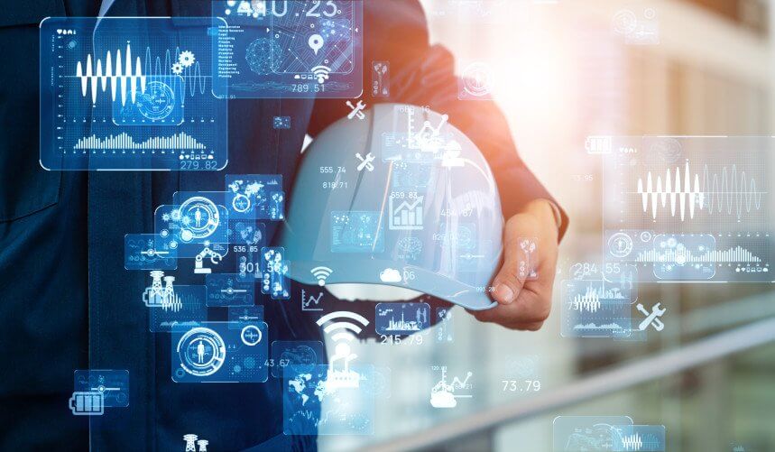 Person holding a hard hat surrounded by digital technology icons and data overlays.