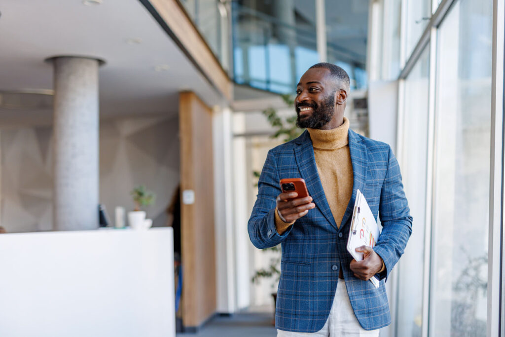 Happy facility manager in modern office.