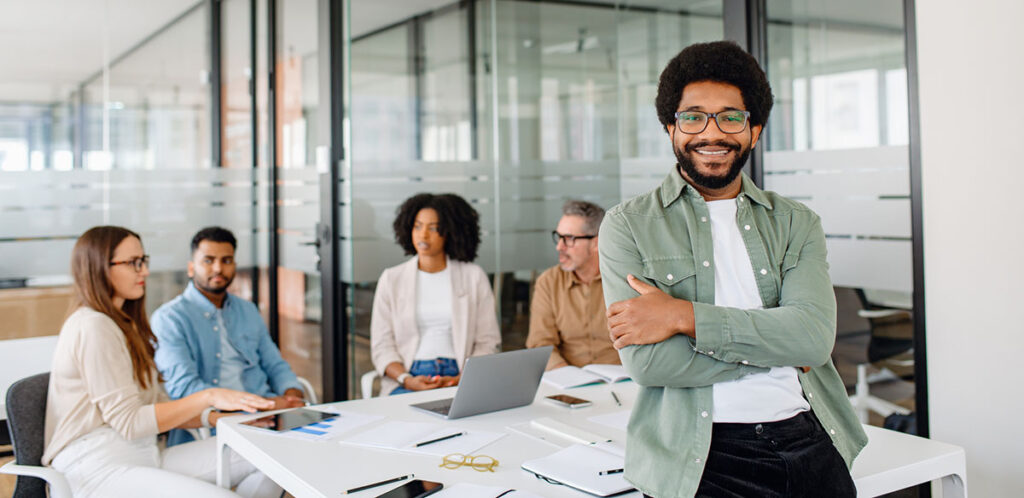 Happy office manager in meeting.