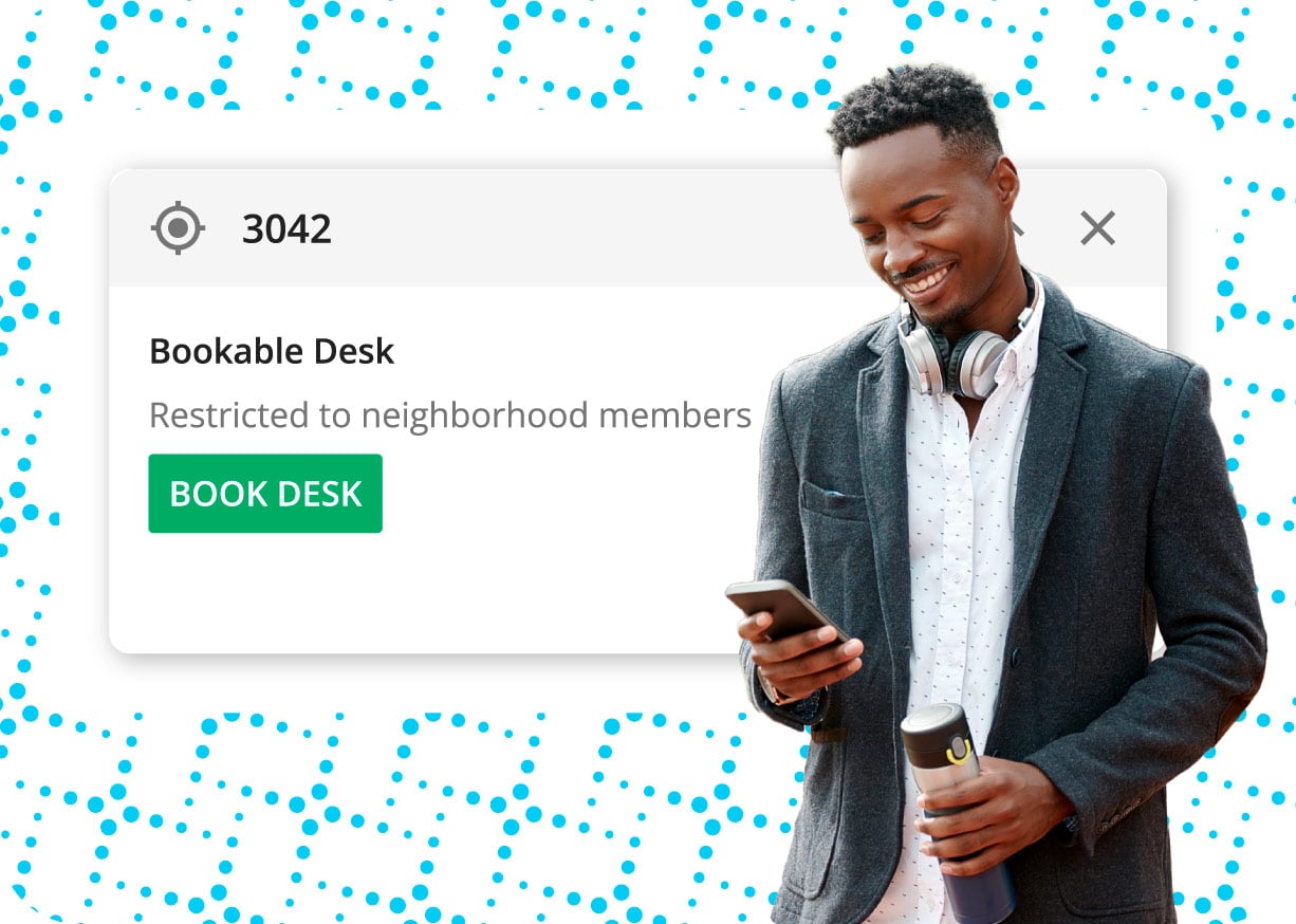 Man using a mobile app to book a desk remotely