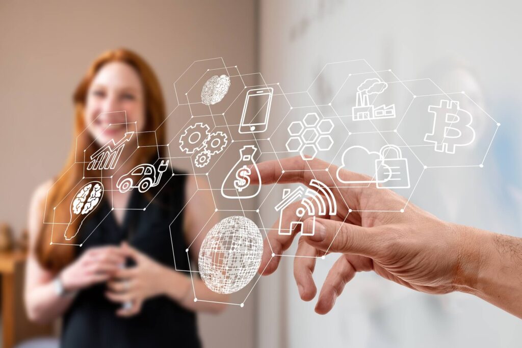 Person interacting with virtual icons, including a car, dollar sign, and Bitcoin symbol, on a transparent interface.